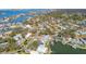 Wide aerial showcasing waterfront homes at 1897 Clearwater Harbor Dr, Largo, FL 33770