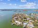 Aerial view of waterfront homes and community at 1897 Clearwater Harbor Dr, Largo, FL 33770