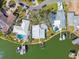Aerial view of home, pool, and private dock at 1897 Clearwater Harbor Dr, Largo, FL 33770