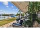 Relaxing patio area with seating and water views at 1897 Clearwater Harbor Dr, Largo, FL 33770