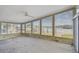 Sunroom with water views and large windows at 1897 Clearwater Harbor Dr, Largo, FL 33770