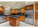 Eat-in kitchen, granite countertops, stainless steel appliances at 1903 Oro Ct, Clearwater, FL 33764