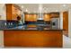 Spacious kitchen with granite countertops and wood cabinets at 1903 Oro Ct, Clearwater, FL 33764