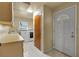 Laundry room with washer, dryer, and cabinets at 1903 Oro Ct, Clearwater, FL 33764