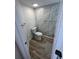 Bathroom with shower/tub combo and updated vanity at 19505 Quesada Ave # O105, Port Charlotte, FL 33948