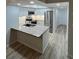 Modern kitchen with stainless steel appliances and granite countertops at 19505 Quesada Ave # O105, Port Charlotte, FL 33948