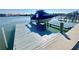 Spacious boat dock with a covered boat lift at 211 Bath Club N Blvd, North Redington Beach, FL 33708