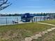 Private boat lift on a spacious dock, perfect for enjoying Florida's waterways at 211 Bath Club N Blvd, North Redington Beach, FL 33708