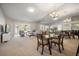 Spacious living room with sectional sofa and large mirror at 2112 Gulf View Blvd, Dunedin, FL 34698