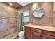 Updated bathroom with a large walk-in shower and new vanity at 2851 Hardee Dr, Sarasota, FL 34231