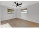 Spacious bedroom with two windows and ceiling fan at 2851 Hardee Dr, Sarasota, FL 34231