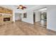Open living room with tile floors and views into other rooms at 2851 Hardee Dr, Sarasota, FL 34231