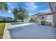 Refreshing pool with large patio and sliding doors to home at 2851 Hardee Dr, Sarasota, FL 34231