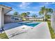 Relaxing pool and patio area with lush landscaping at 2851 Hardee Dr, Sarasota, FL 34231