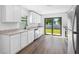Modern kitchen with stainless steel appliances and granite countertops at 29603 Fedora Cir, Brooksville, FL 34602
