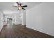 Bright and airy living area with wood-look flooring at 29603 Fedora Cir, Brooksville, FL 34602