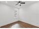 Spacious bedroom with hardwood floors and ample natural light at 320 W Jean St, Tampa, FL 33604