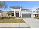 Modern two-story house with attached garage at 3317 W Napoleon Ave, Tampa, FL 33611