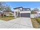 Modern two-story house with attached garage at 3317 W Napoleon Ave, Tampa, FL 33611