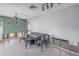 Dining area with a modern table and metal chairs at 4000 14Th Ne St, St Petersburg, FL 33703