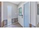 Bright entryway with glass panels and tiled flooring at 4000 14Th Ne St, St Petersburg, FL 33703