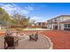 Enjoyable back yard with a fire pit, pool, and outdoor entertaining area at 403 Weeburn Rd, Temple Terrace, FL 33617