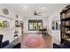 Open-concept dining area offers ample space with views of the backyard pool and unique tile flooring at 403 Weeburn Rd, Temple Terrace, FL 33617