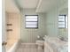 Bathroom with a bathtub, toilet and vanity at 4726 Windflower Cir, Tampa, FL 33624