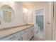 Updated bathroom with granite countertops and walk-in shower at 4726 Windflower Cir, Tampa, FL 33624