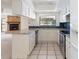 Kitchen features granite countertops and stainless steel appliances at 4726 Windflower Cir, Tampa, FL 33624