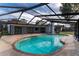 Inviting screened pool area with spacious patio at 4726 Windflower Cir, Tampa, FL 33624