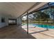 Covered patio overlooking the refreshing pool at 4726 Windflower Cir, Tampa, FL 33624