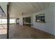 Covered patio adjacent to the pool and sliding glass doors at 4726 Windflower Cir, Tampa, FL 33624