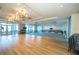 Expansive event space with modern lighting, elegant chandeliers, and versatile flooring for large gatherings and celebrations at 4748 Ballast Crest Cv, Land O Lakes, FL 34638