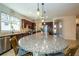 Modern kitchen with central island, stainless steel appliances, and granite countertops and flooring at 4748 Ballast Crest Cv, Land O Lakes, FL 34638