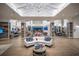 Spacious lobby featuring modern decor, seating and a view of community amenities at 4748 Ballast Crest Cv, Land O Lakes, FL 34638