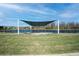 Outdoor pavilion and stage for community events with a scenic lake view at 4748 Ballast Crest Cv, Land O Lakes, FL 34638
