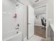 Clean bathroom with white tile and bathtub at 5351 Bridge St # 67, Tampa, FL 33611