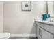 Clean powder room with modern vanity and fixtures, well lit at 5351 Bridge St # 67, Tampa, FL 33611
