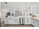 Modern kitchen featuring a farmhouse sink and stainless steel appliances at 5351 Bridge St # 67, Tampa, FL 33611