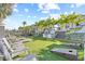 Community lawn with grills, lounge chairs, and games at 5351 Bridge St # 67, Tampa, FL 33611