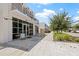 Clean view of a white modern retail shopping center with sidewalks at 5351 Bridge St # 67, Tampa, FL 33611