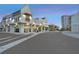 Retail shops at dusk, featuring stylish architecture at 5351 Bridge St # 67, Tampa, FL 33611
