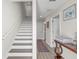 Modern staircase with white risers and dark wood treads at 5351 Bridge St # 67, Tampa, FL 33611