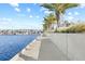 Waterfront path with palm trees and marina view at 5351 Bridge St # 67, Tampa, FL 33611