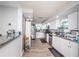 Modern kitchen featuring stainless steel appliances and granite countertops at 5405 Golden Nugget Dr, Holiday, FL 34690