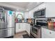 Kitchen featuring stainless steel appliances and granite countertops at 5405 Golden Nugget Dr, Holiday, FL 34690