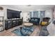 Spacious living room with a large entertainment center, stylish furniture, and lots of space at 5405 Golden Nugget Dr, Holiday, FL 34690