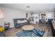 Cozy living room blending into the dining room and kitchen areas at 5405 Golden Nugget Dr, Holiday, FL 34690