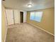 Simple bedroom with closet and neutral color walls at 6224 Seabreeze Dr, Port Richey, FL 34668